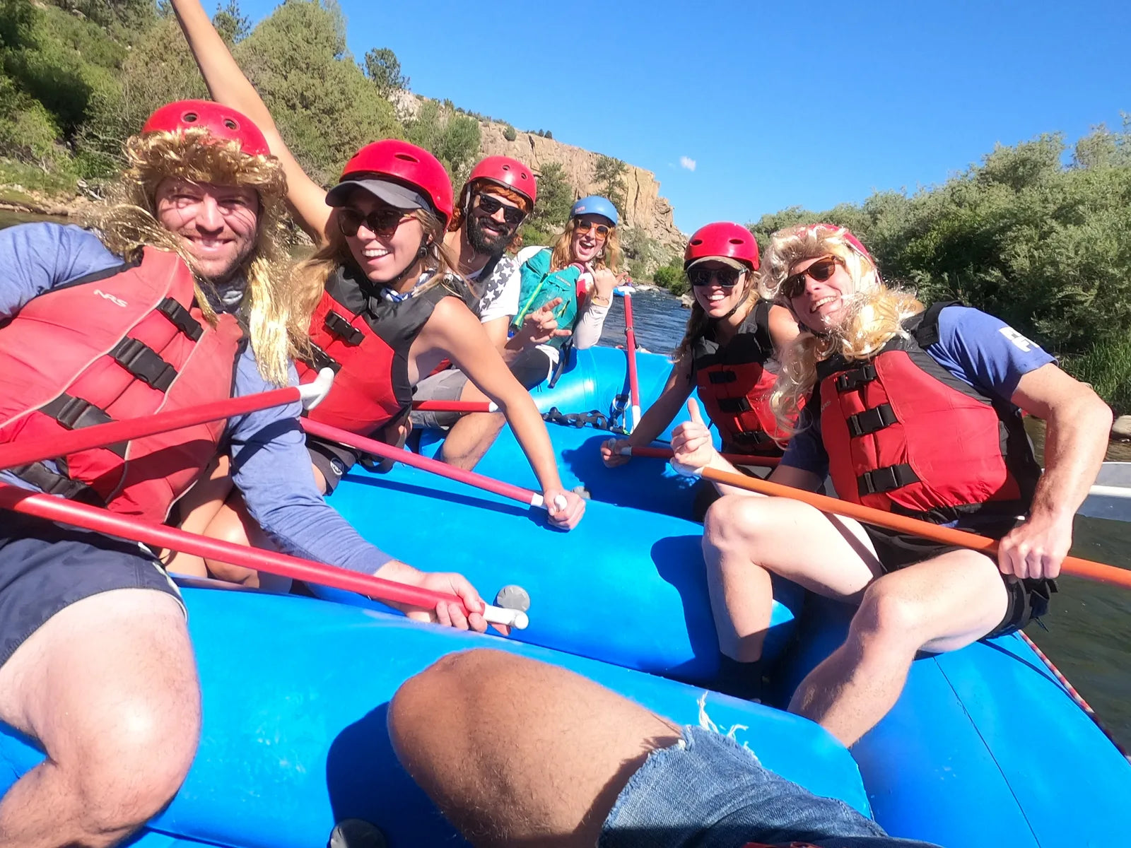 A wigged rafting crew